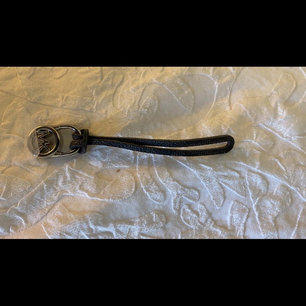 Michael Kors accessories for bag, etc.